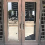 Metal entrance doors before refinishing