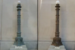 Before and after of ornate bronze light pole with and without green oxidation